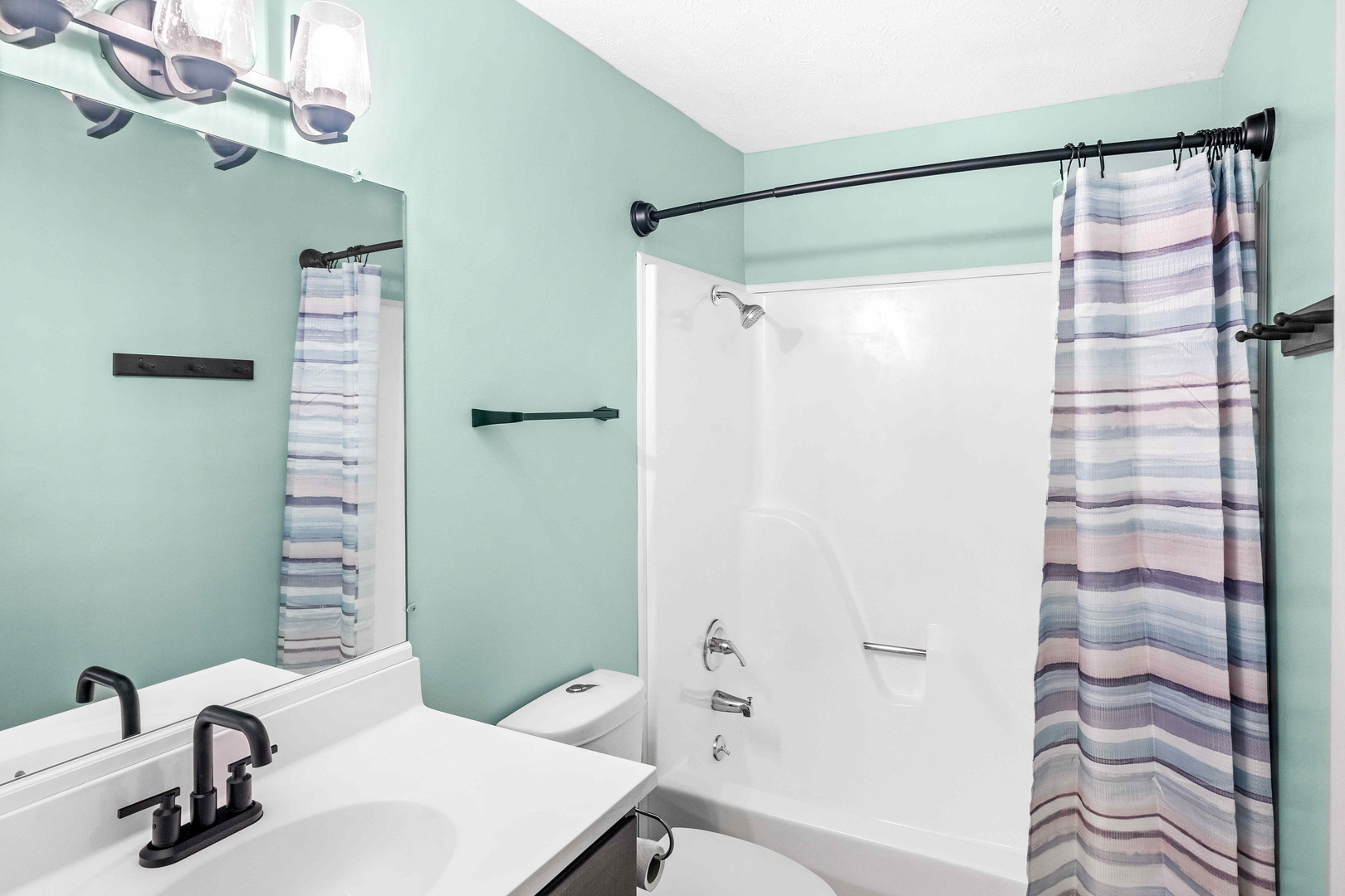 903 North Linden Street, Unit 17 Normal, IL 61761 - Photo 16 of 26 a bathroom with a sink and a shower