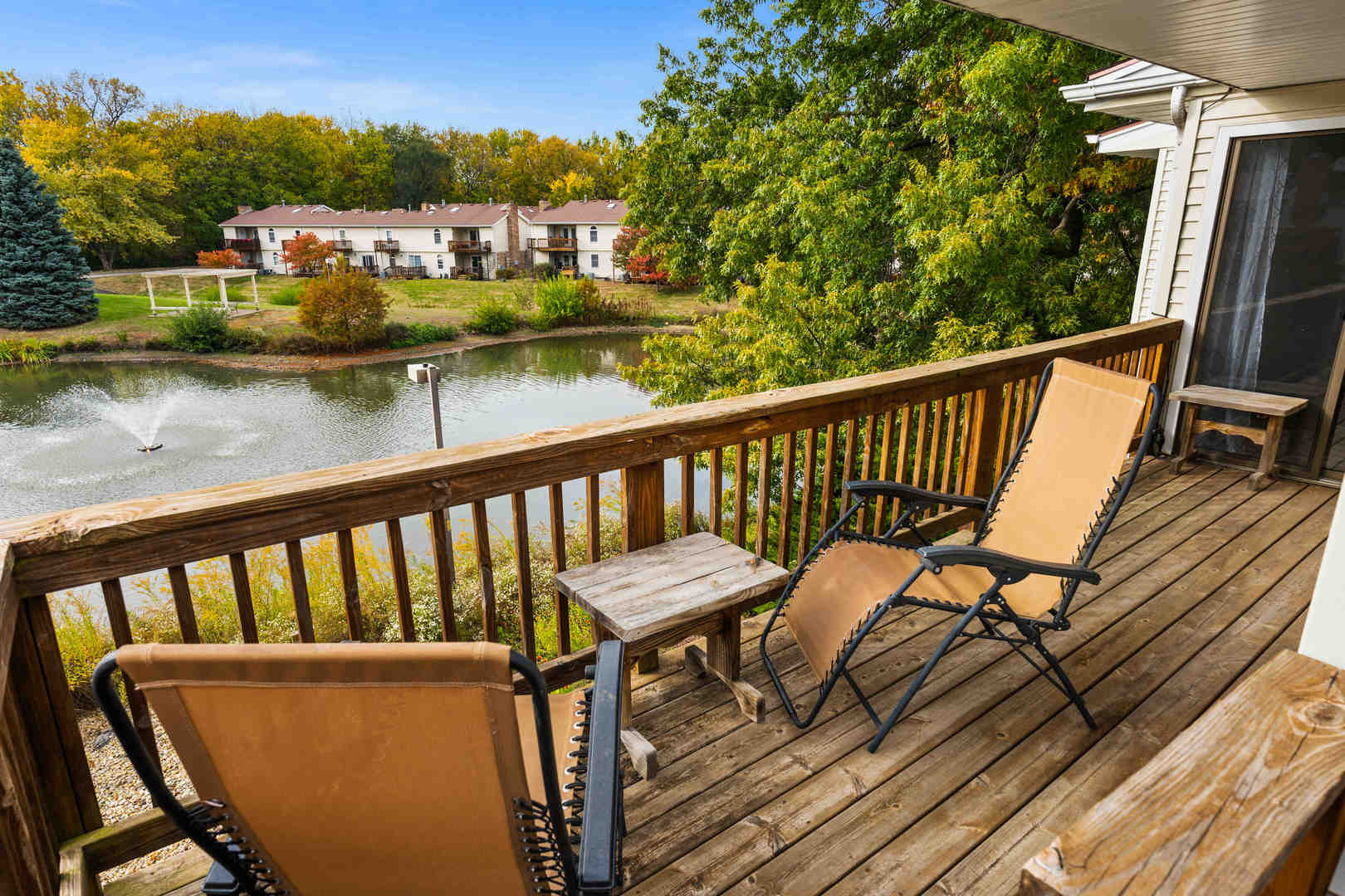 903 North Linden Street, Unit 17 Normal, IL 61761 - Photo 21 of 26 a view of a chairs and table on the balcony