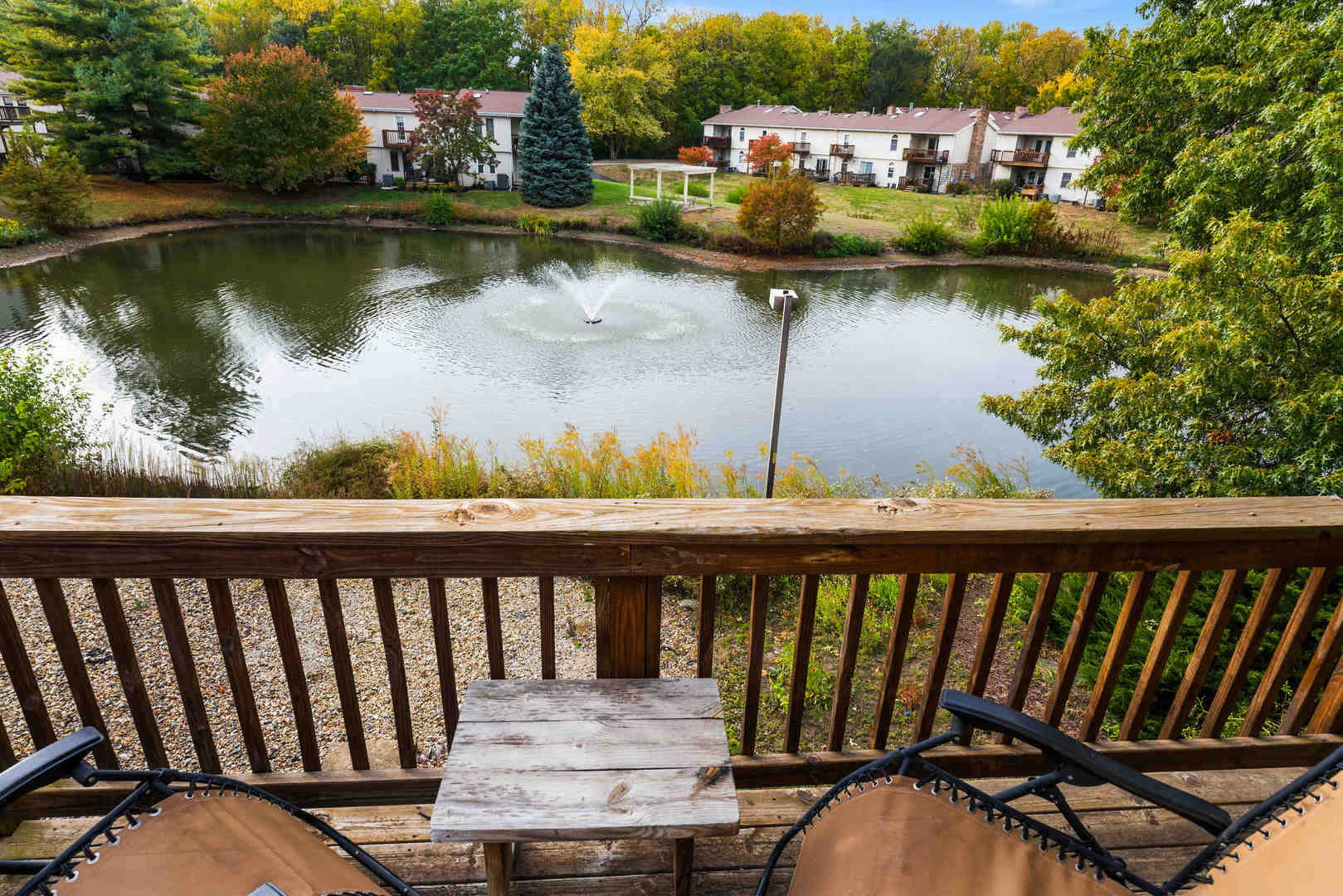 903 North Linden Street, Unit 17 Normal, IL 61761 - Photo 22 of 26 a view of a wooden deck and lake