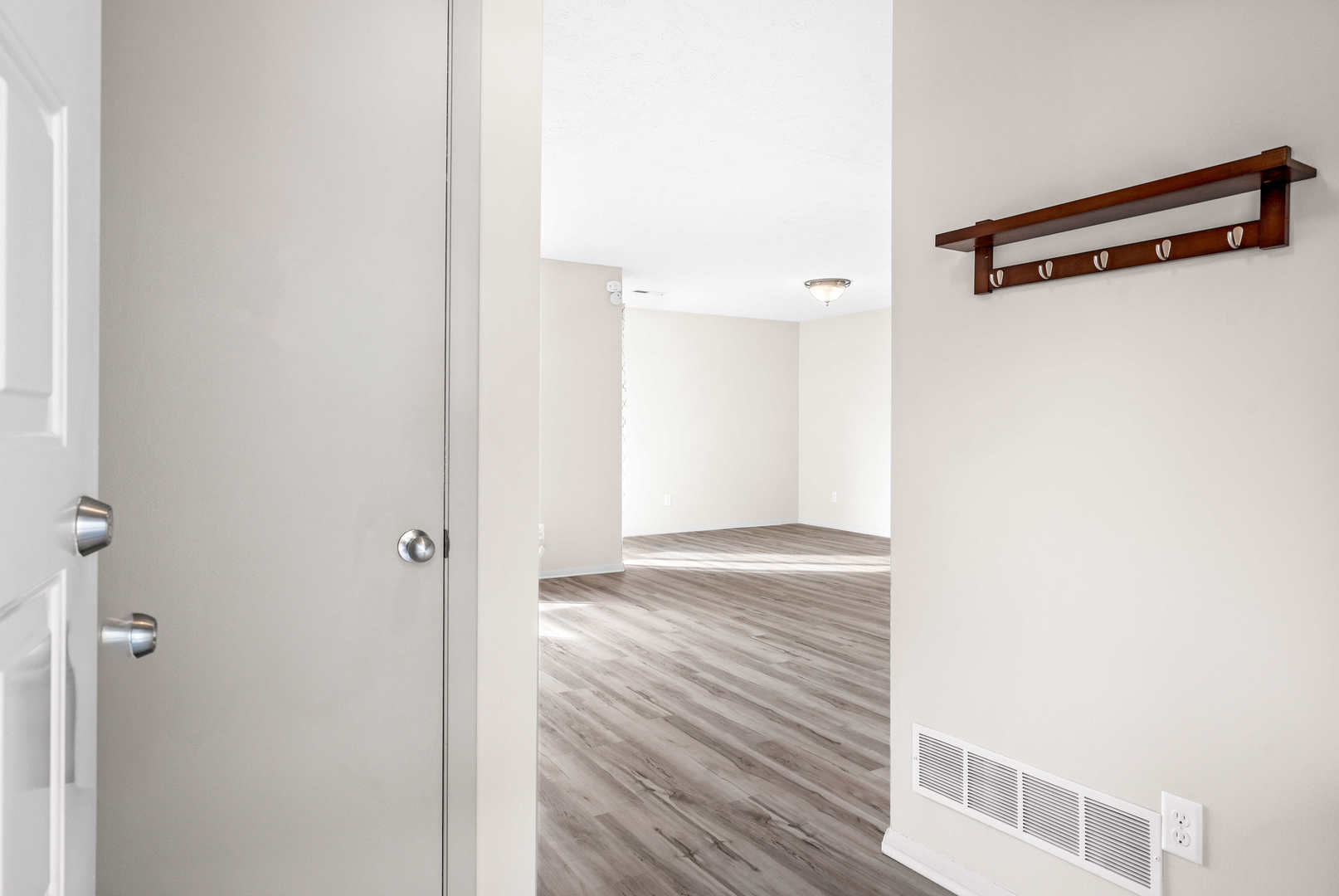 903 North Linden Street, Unit 17 Normal, IL 61761 - Photo 3 of 26 a view of a room with wooden floor