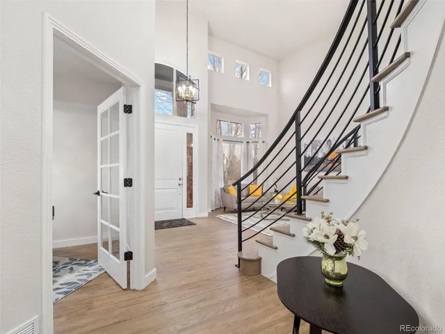 a workspace with furniture and wooden floor