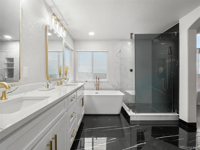 a bedroom with bed and a window