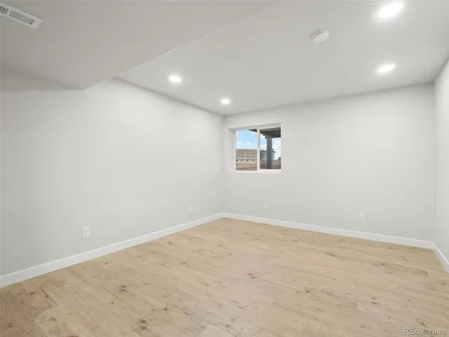 a view of backyard with a deck