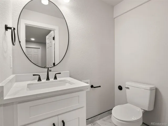 a picture of a bathroom with a sink