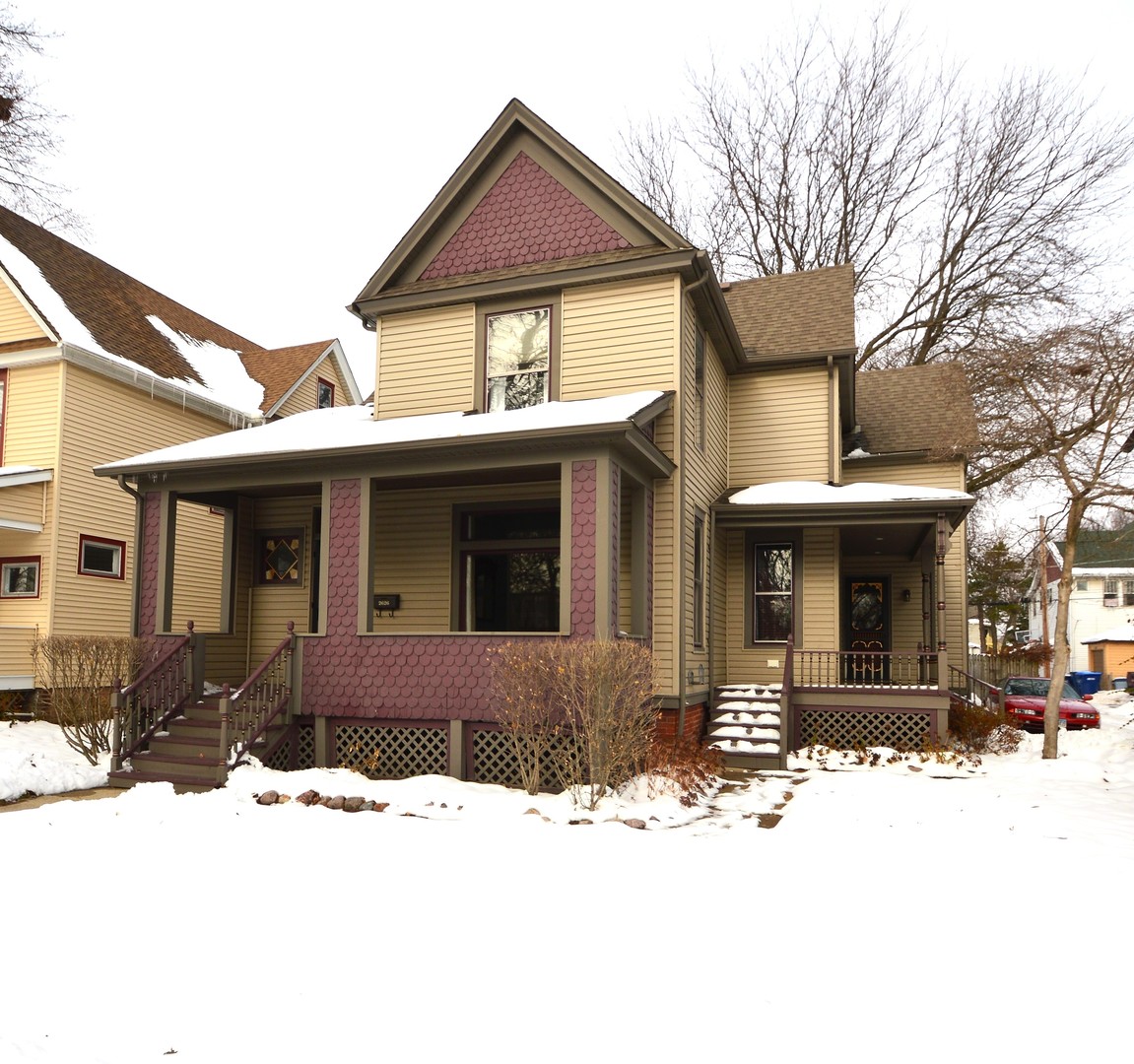 2626 Union Street Blue Island, IL 60406 - Photo 1 of 32 a front view of a house with a yard covered in snow