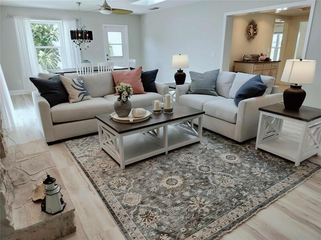 4766 South Atlantic Avenue Ponce Inlet, FL 32127 - Photo 9 of 32 a living room with furniture and a rug