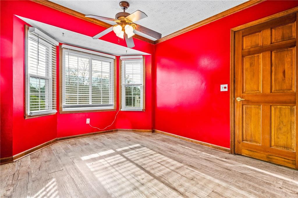 805 Manning Way Southwest Marietta, GA 30064 - Photo 17 of 35 a view of empty room with windows