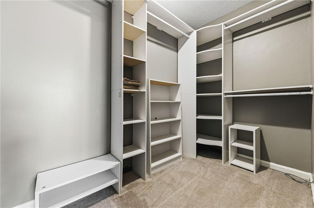 805 Manning Way Southwest Marietta, GA 30064 - Photo 22 of 27 a view of an empty room with empty shelves