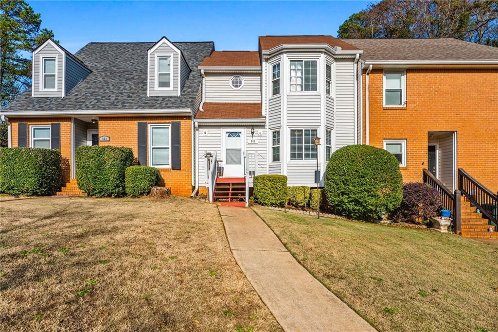 805 Manning Way Southwest Marietta, GA 30064 - Photo 27 of 27 a front view of a house with a yard