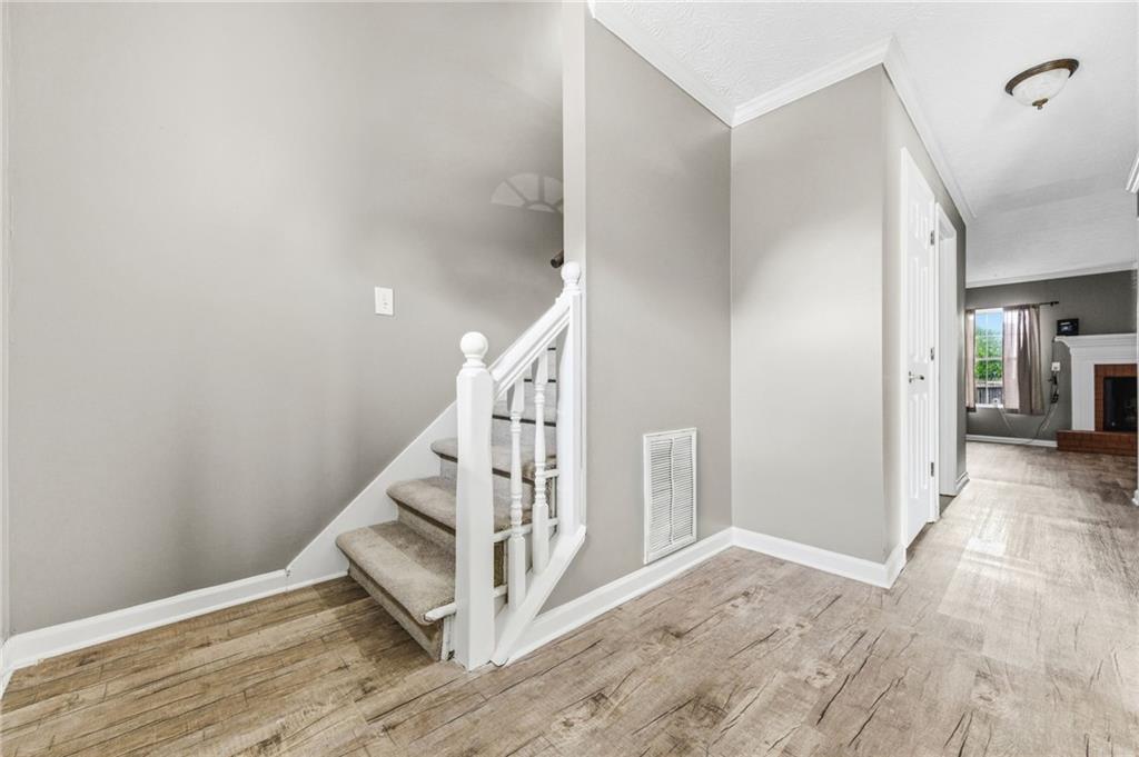 805 Manning Way Southwest Marietta, GA 30064 - Photo 4 of 27 a view of entryway with wooden floor