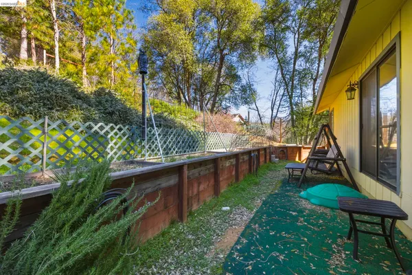 a view of swimming pool with a patio