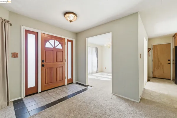 a view of an empty room and window