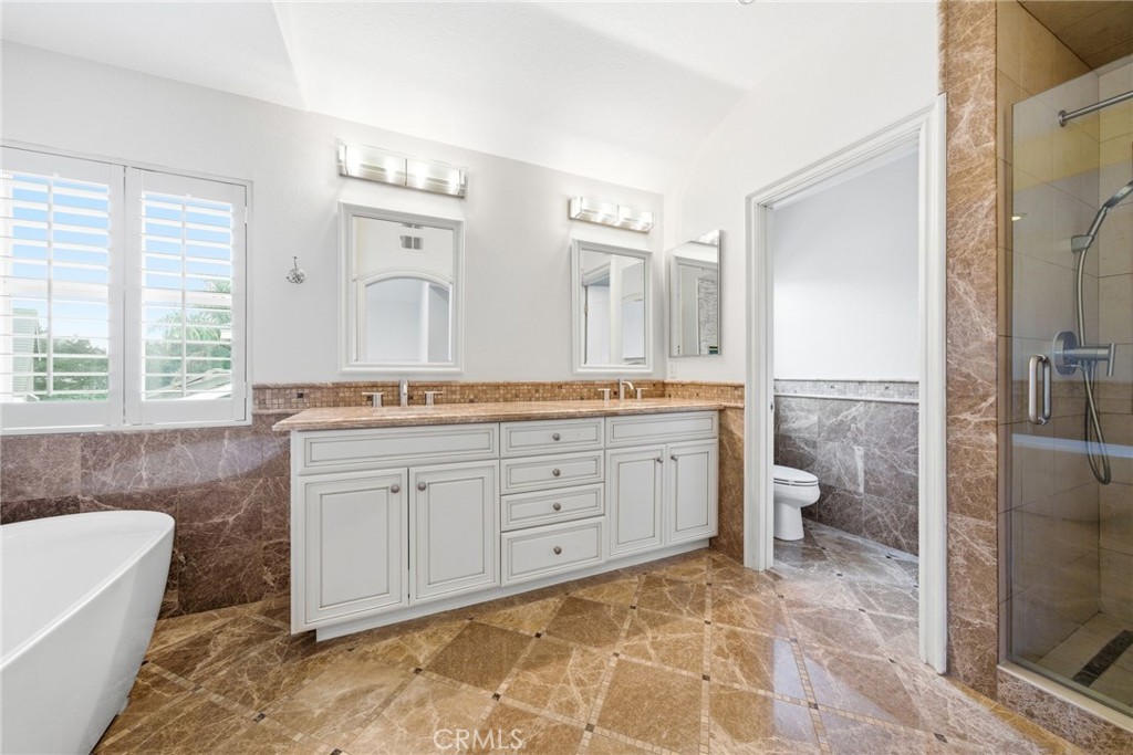 8082 Centerstone Drive Huntington Beach, CA 92646 - Photo 17 of 26 Master Upper level On Suite