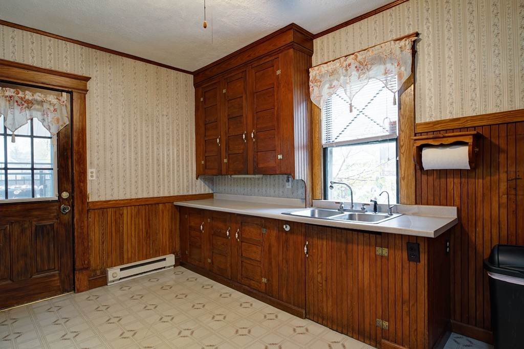 86 Osborne Terrace Springfield, MA 01104 - Photo 12 of 30 a kitchen with a sink and a window