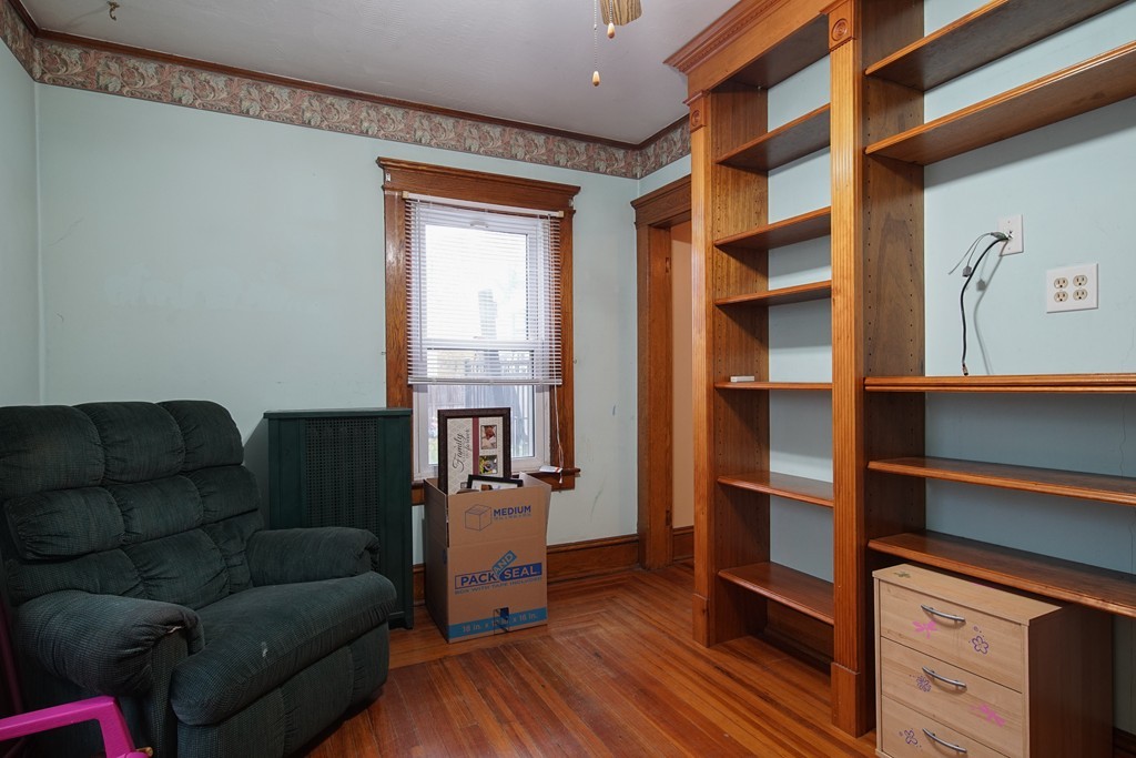 86 Osborne Terrace Springfield, MA 01104 - Photo 15 of 30 a living room with furniture and a window