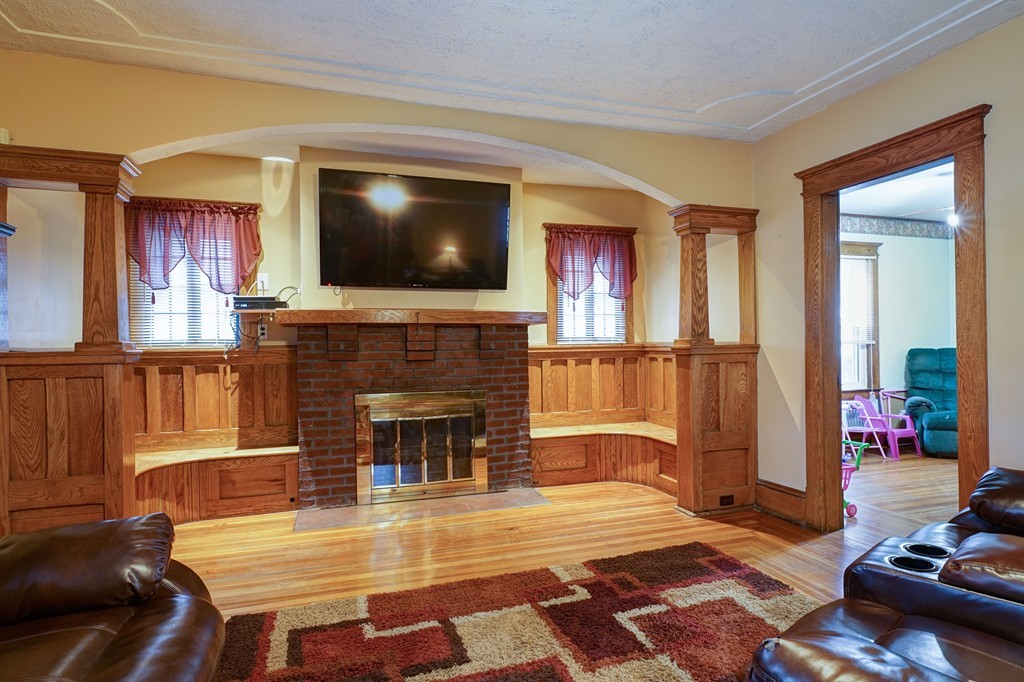 86 Osborne Terrace Springfield, MA 01104 - Photo 2 of 30 a living room with furniture fireplace and flat screen tv
