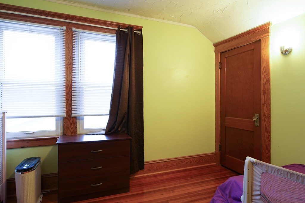 86 Osborne Terrace Springfield, MA 01104 - Photo 22 of 30 view of room with window and wardrobe