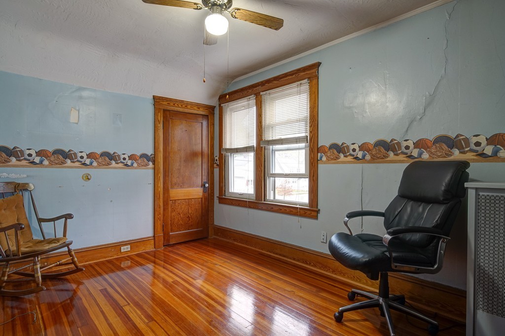 86 Osborne Terrace Springfield, MA 01104 - Photo 24 of 30 a living room with furniture and a window