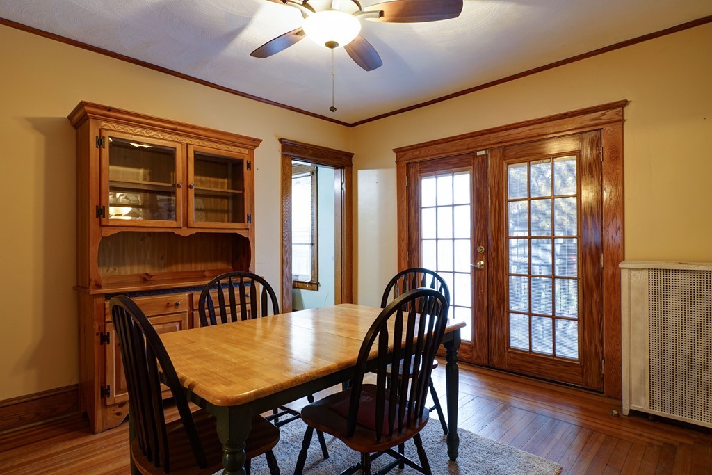 86 Osborne Terrace Springfield, MA 01104 - Photo 8 of 30 a view of a dining room with furniture window and wooden floor