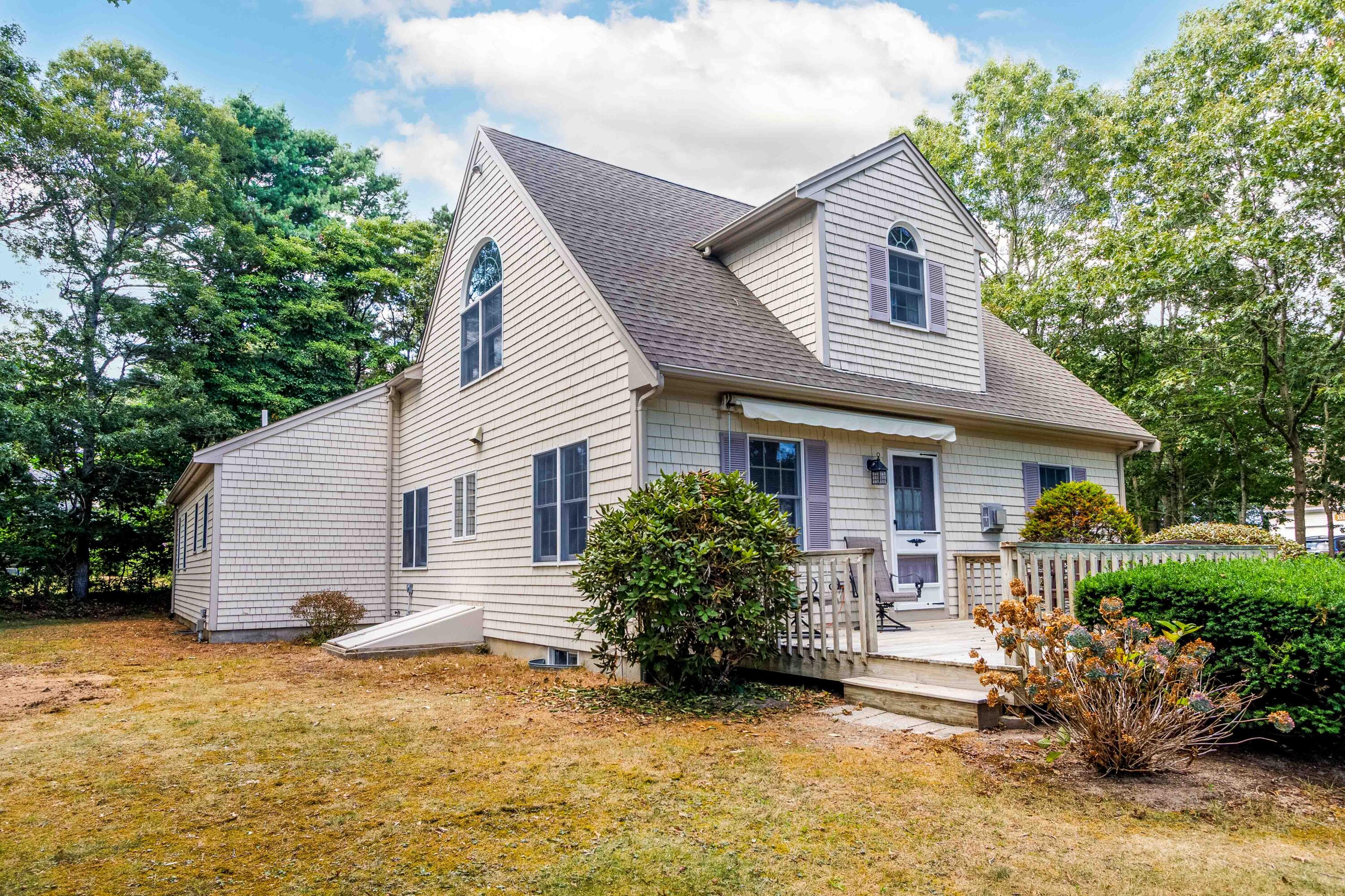 49 Rivers End Road East Falmouth, MA 02536 - Photo 26 of 32 a view of a house with backyard and garden
