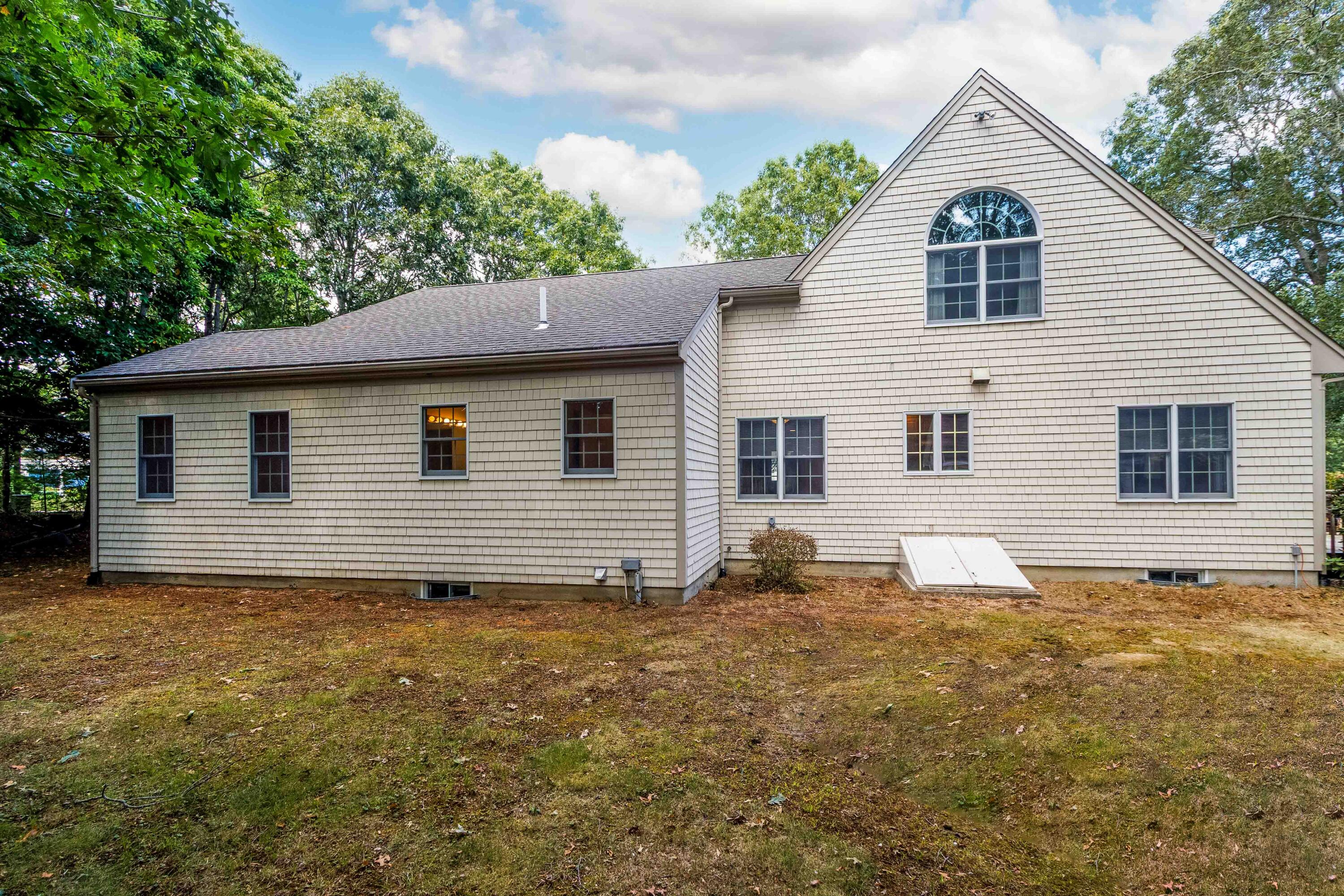 49 Rivers End Road East Falmouth, MA 02536 - Photo 28 of 32 a view of a house with a yard