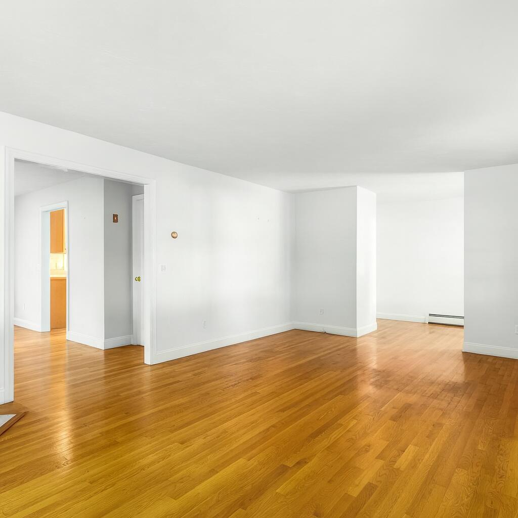 49 Rivers End Road East Falmouth, MA 02536 - Photo 5 of 32 a view of an empty room and wooden floor