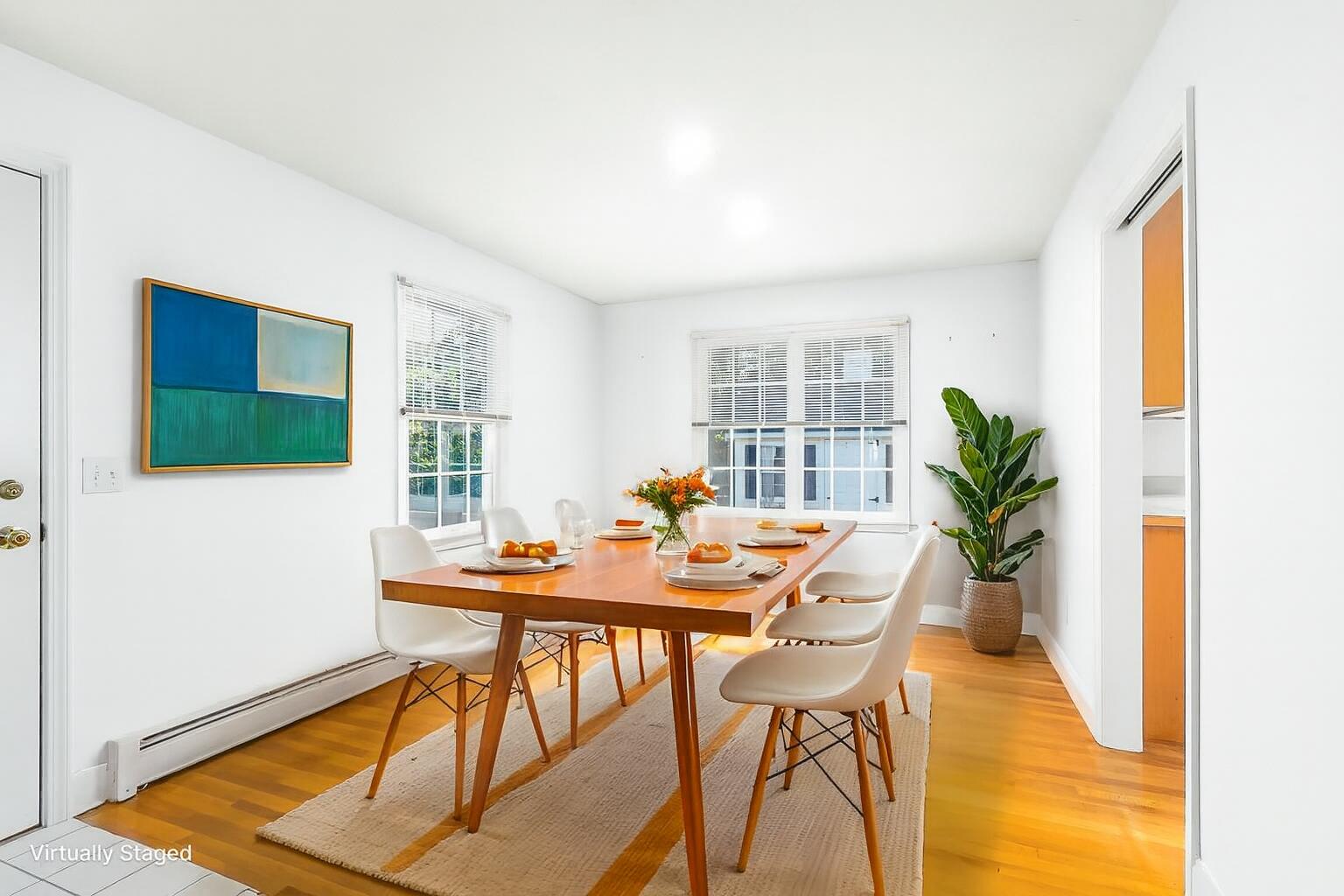 49 Rivers End Road East Falmouth, MA 02536 - Photo 7 of 32 a view of a dining room with furniture and wooden floor