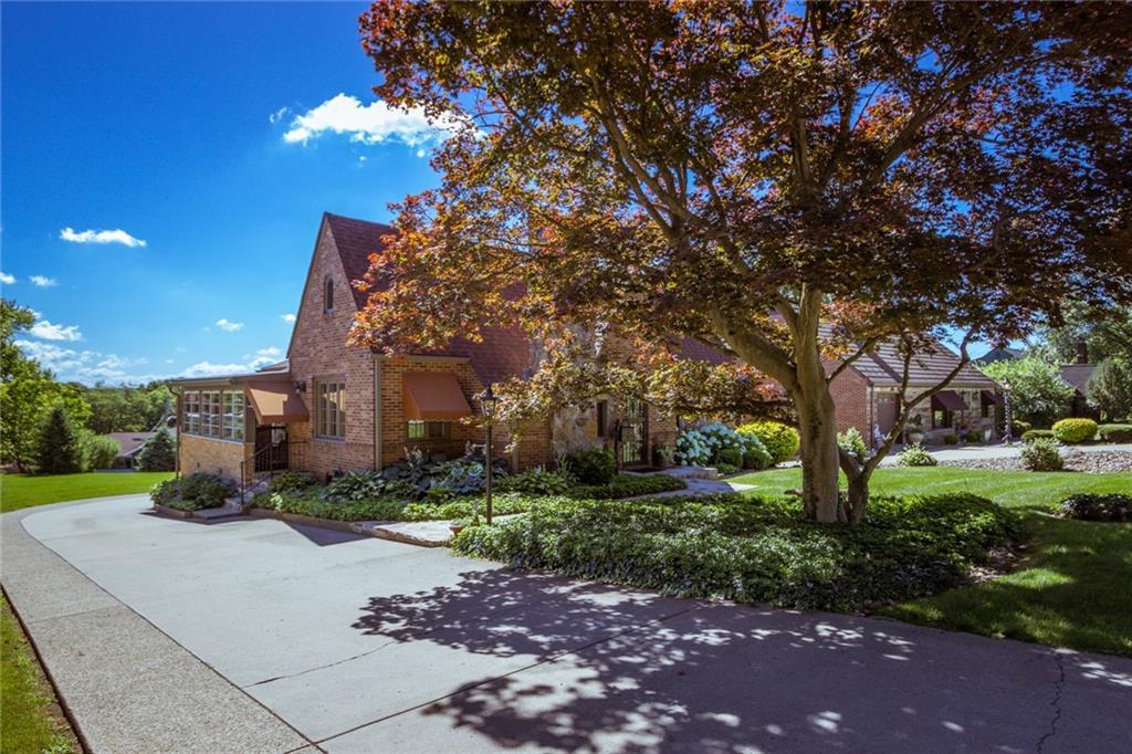 106 Darlington Road Beaver Falls, PA 15010 - Photo 1 of 23 Welcome to 106 Darlington Rd., a stone & brick tudor style home with lush landscaping, quality construction and ample space for your wants. The concrete/aggregate driveway widens and leads to the rear entry garage.