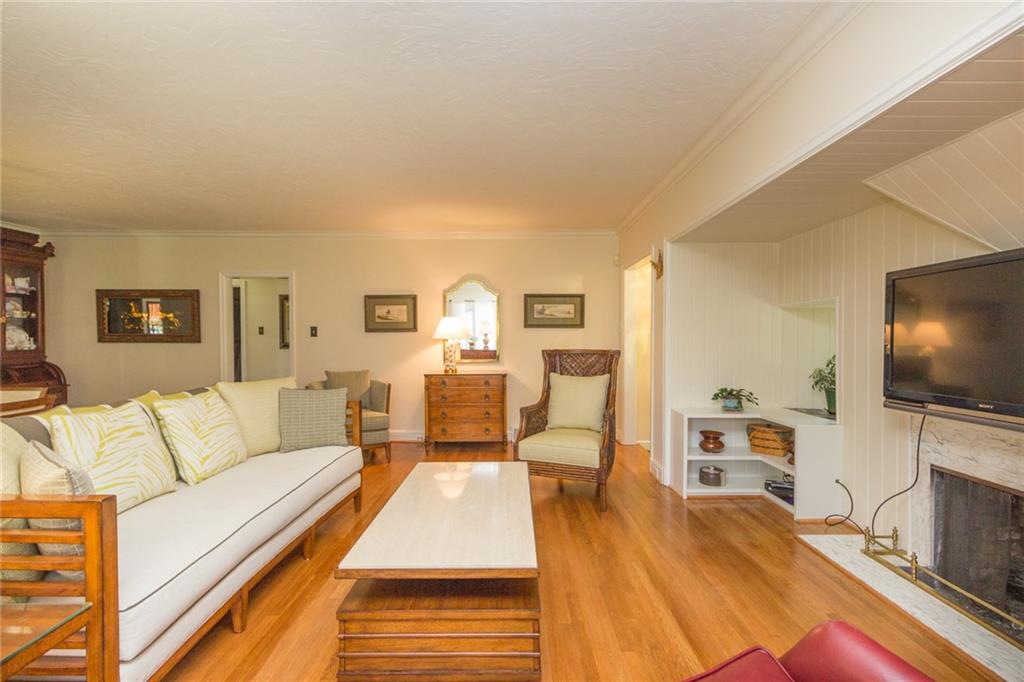 106 Darlington Road Beaver Falls, PA 15010 - Photo 3 of 23 Living Room boasts charm with its angles, built-ins and bump-outs. Be a part of the conversation around the dinner table! Enjoy a warm fire at the end of your day!