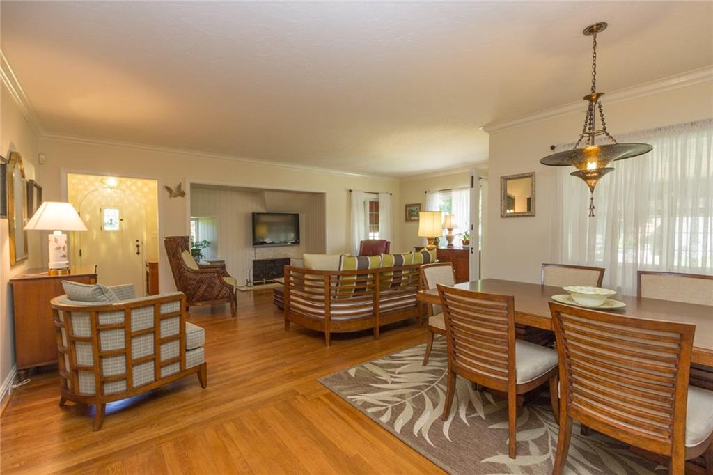 106 Darlington Road Beaver Falls, PA 15010 - Photo 6 of 23 In the foreground, note the quaint front foyer. The hardwood floors add texture and style and make the crown moulding and custom trim pop throughout. Large enough to entertain yet inviting for just you.