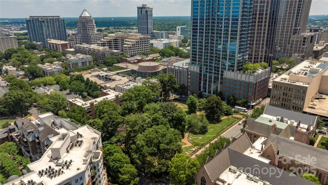 a view of a city with tall buildings