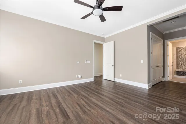 a view of a bathroom from the hallway