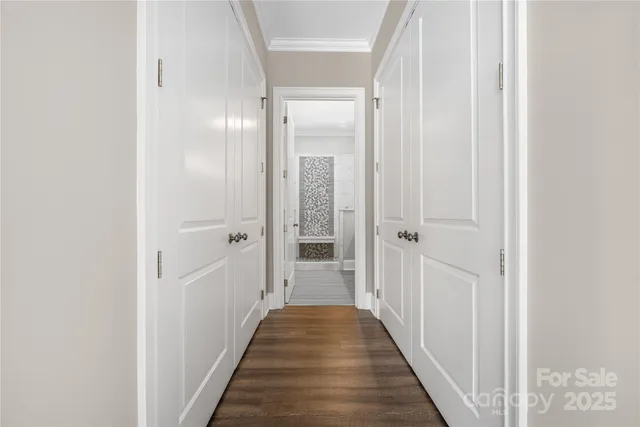 a bathroom with a shower sink and mirror