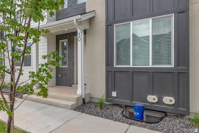 30 South Moonlit Road Mapleton, UT 84664 - Photo 25 of 25 Modern exterior featuring a prominent window with horizontal blinds
