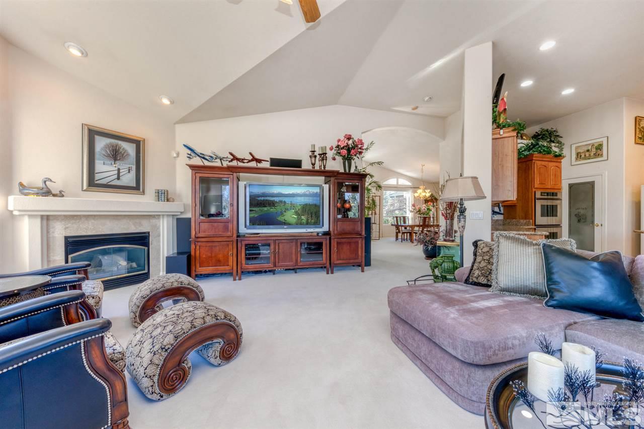 1352 Wolf Run Road Reno, NV 89511 - Photo 13 of 25 a living room with furniture and a fireplace