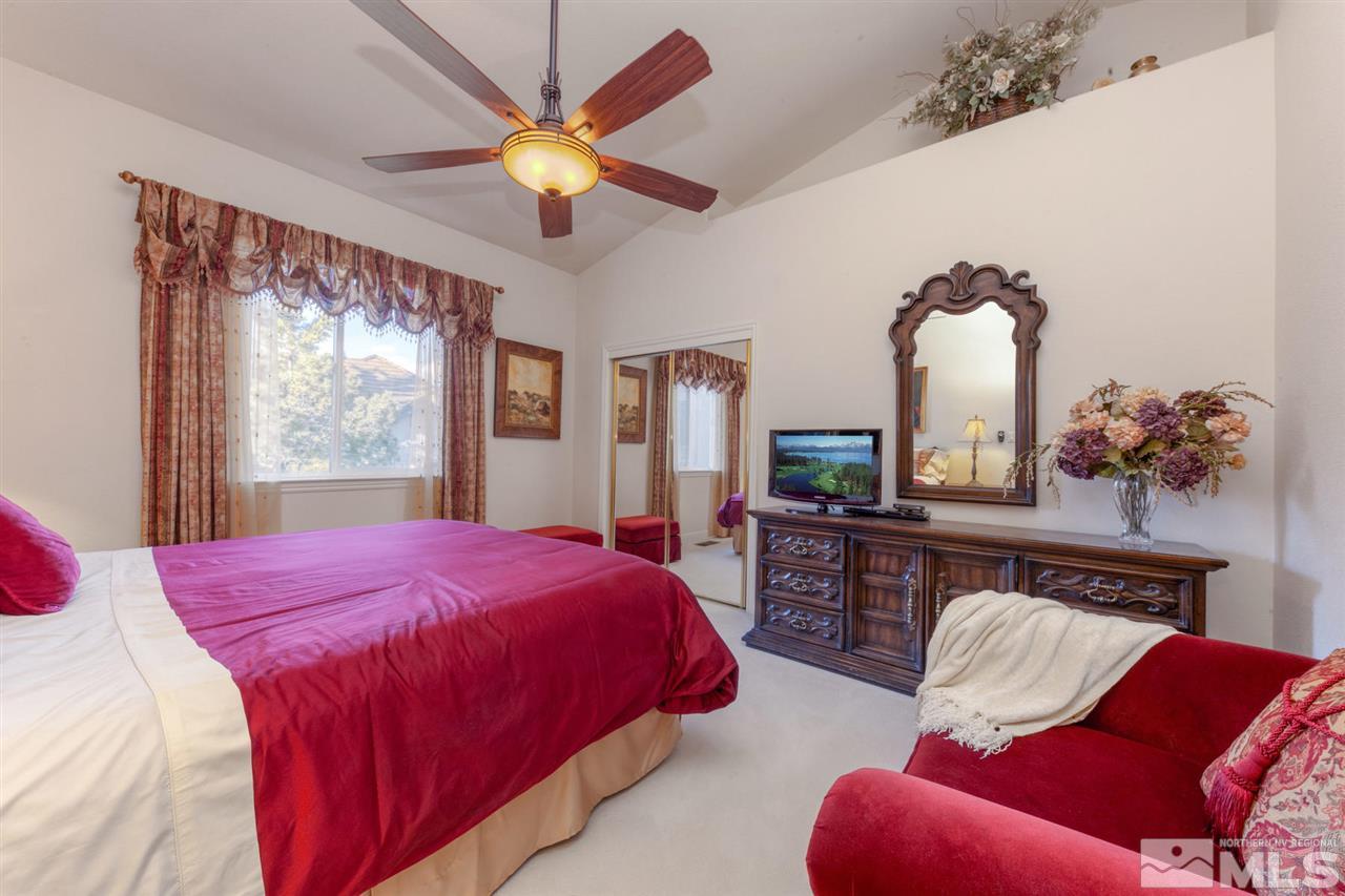 1352 Wolf Run Road Reno, NV 89511 - Photo 23 of 25 a bedroom with bed and a window