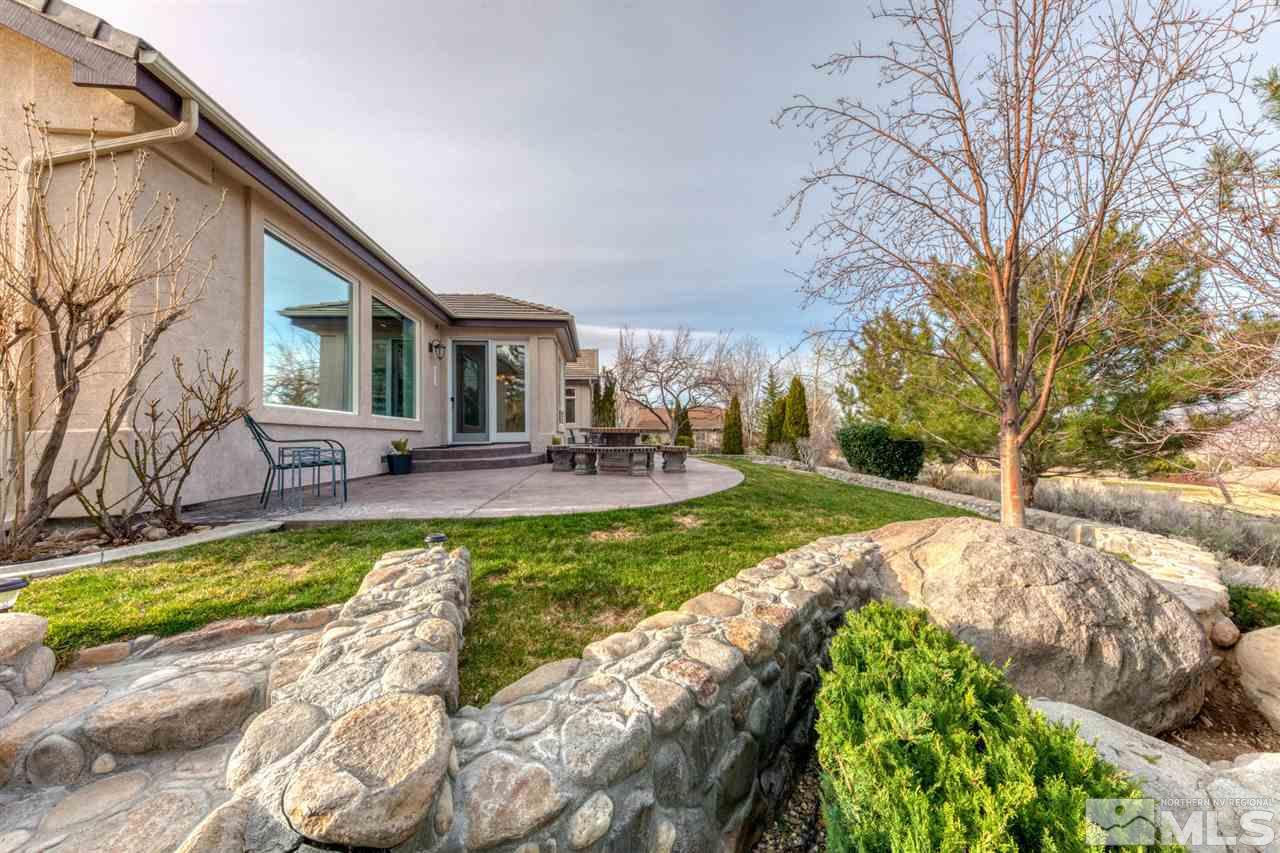 1352 Wolf Run Road Reno, NV 89511 - Photo 4 of 25 a front view of a house with garden