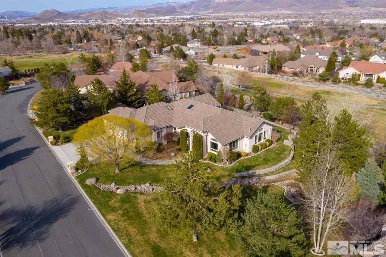 1352 Wolf Run Road Reno, NV 89511 - Photo 7 of 25 an aerial view of residential houses with outdoor space and trees