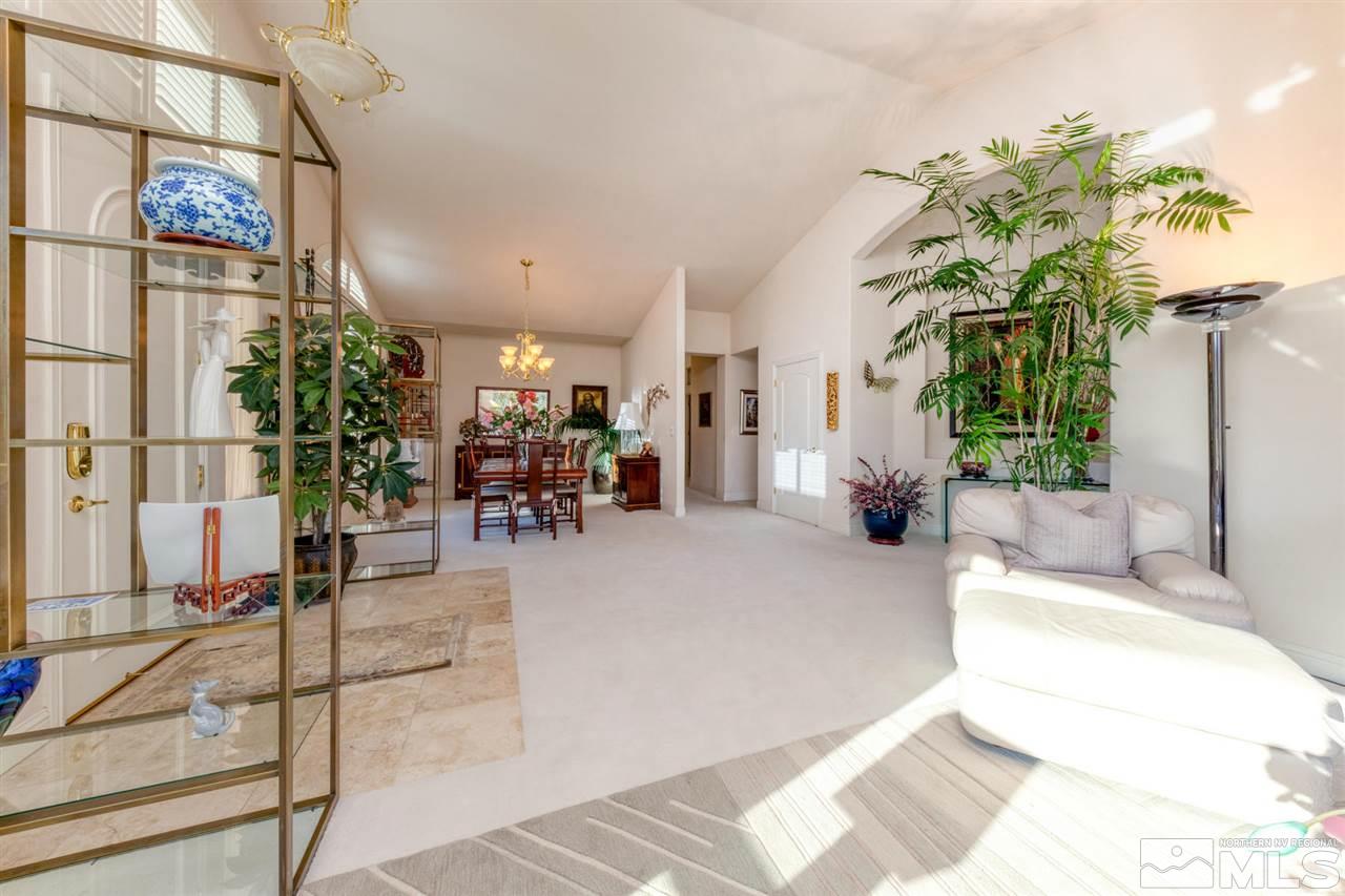 1352 Wolf Run Road Reno, NV 89511 - Photo 9 of 25 a lobby with furniture and potted plants