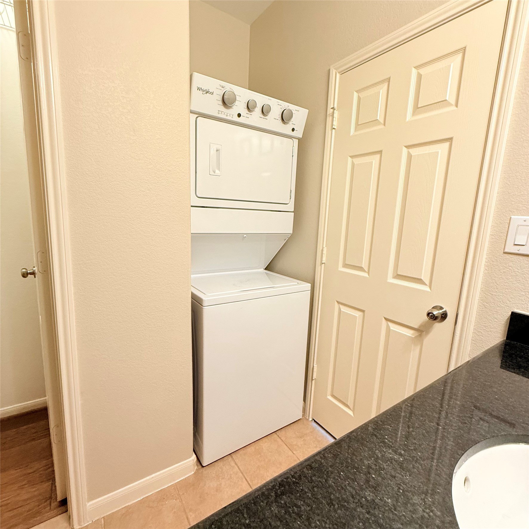 9200 Westheimer Road, Unit 304 Houston, TX 77063 - Photo 15 of 24 a utility room with dryer and washer