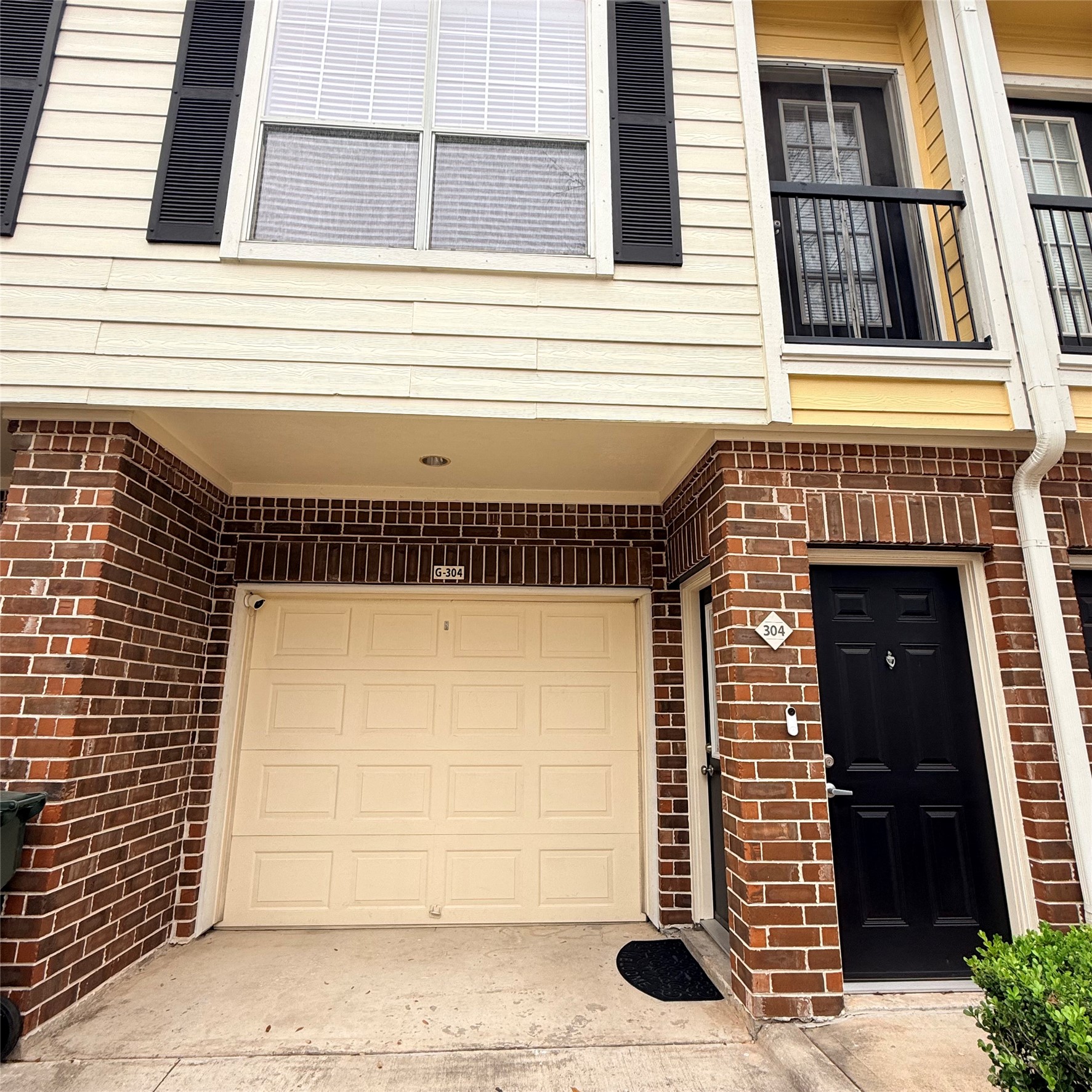 9200 Westheimer Road, Unit 304 Houston, TX 77063 - Photo 2 of 24 a front view of a house with a window