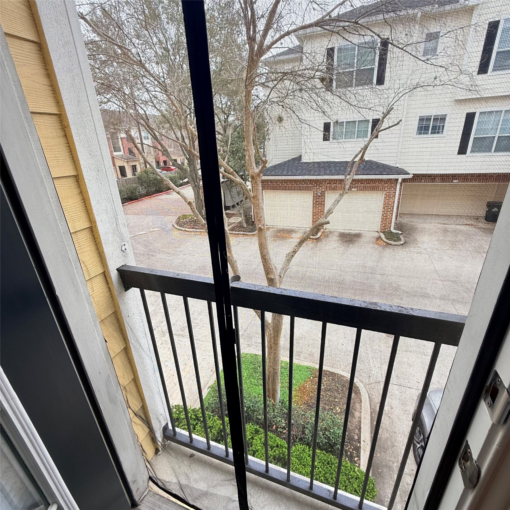 9200 Westheimer Road, Unit 304 Houston, TX 77063 - Photo 10 of 24 a view of a house with wooden deck
