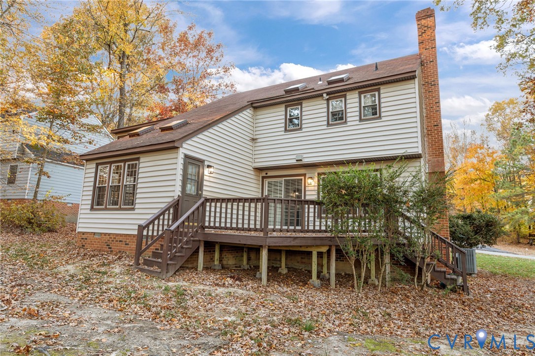 12601 Cottage Mill Road Midlothian, VA 23114 - Photo 13 of 50 a front view of a house with a wooden deck