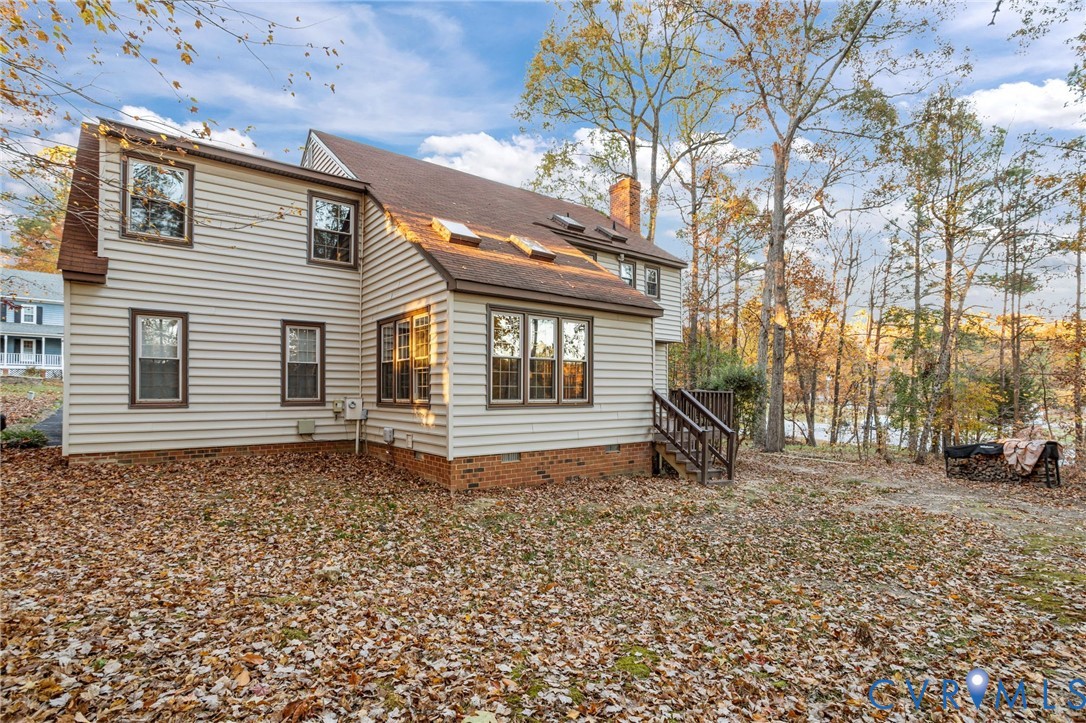 12601 Cottage Mill Road Midlothian, VA 23114 - Photo 15 of 50 a view of a house with a yard