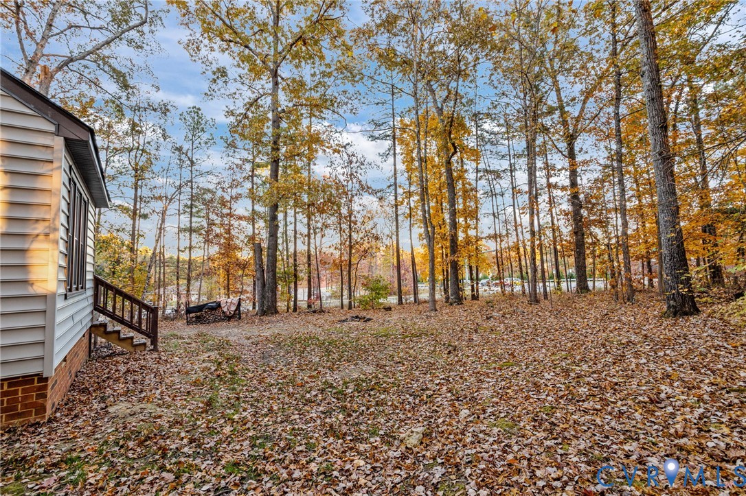 12601 Cottage Mill Road Midlothian, VA 23114 - Photo 16 of 50 a front view of a house with a yard