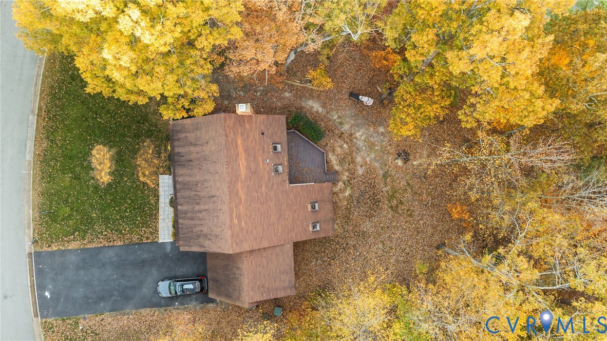 12601 Cottage Mill Road Midlothian, VA 23114 - Photo 17 of 50 front view of a house with a yard and large trees
