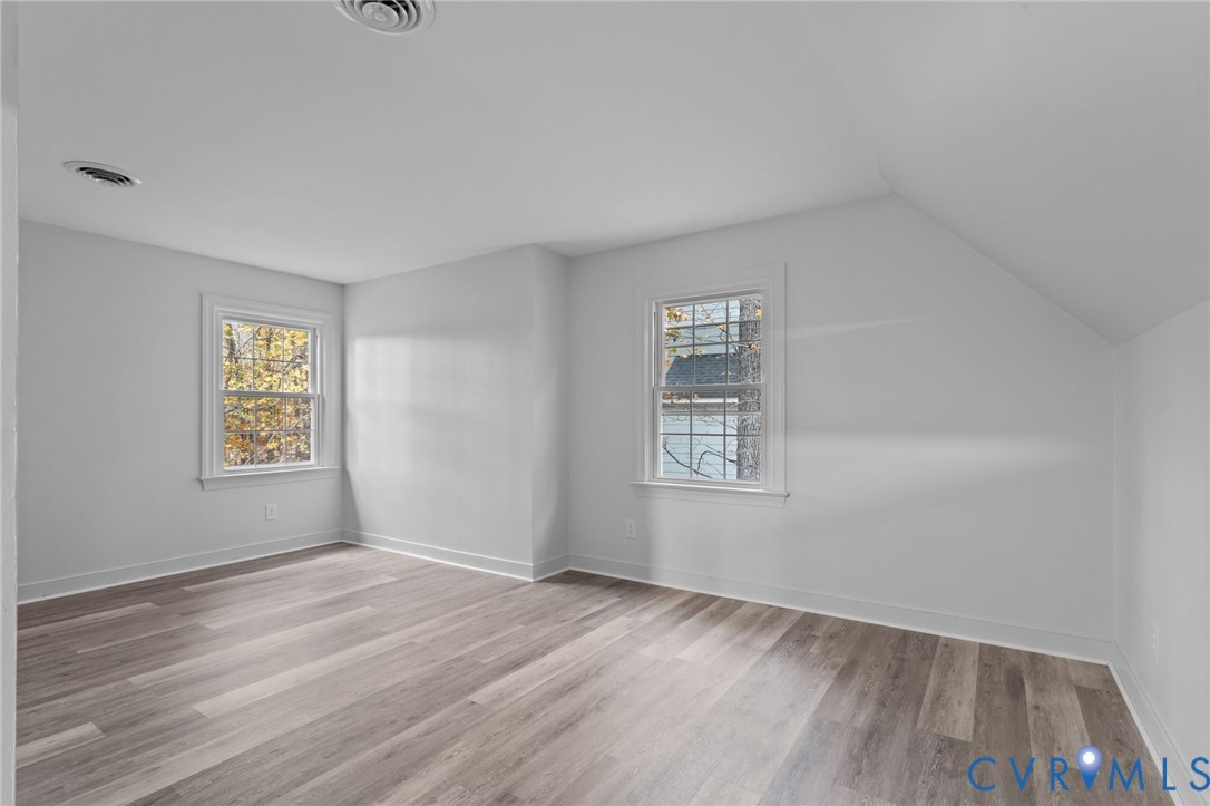 12601 Cottage Mill Road Midlothian, VA 23114 - Photo 23 of 50 wooden floor in an empty room with a window