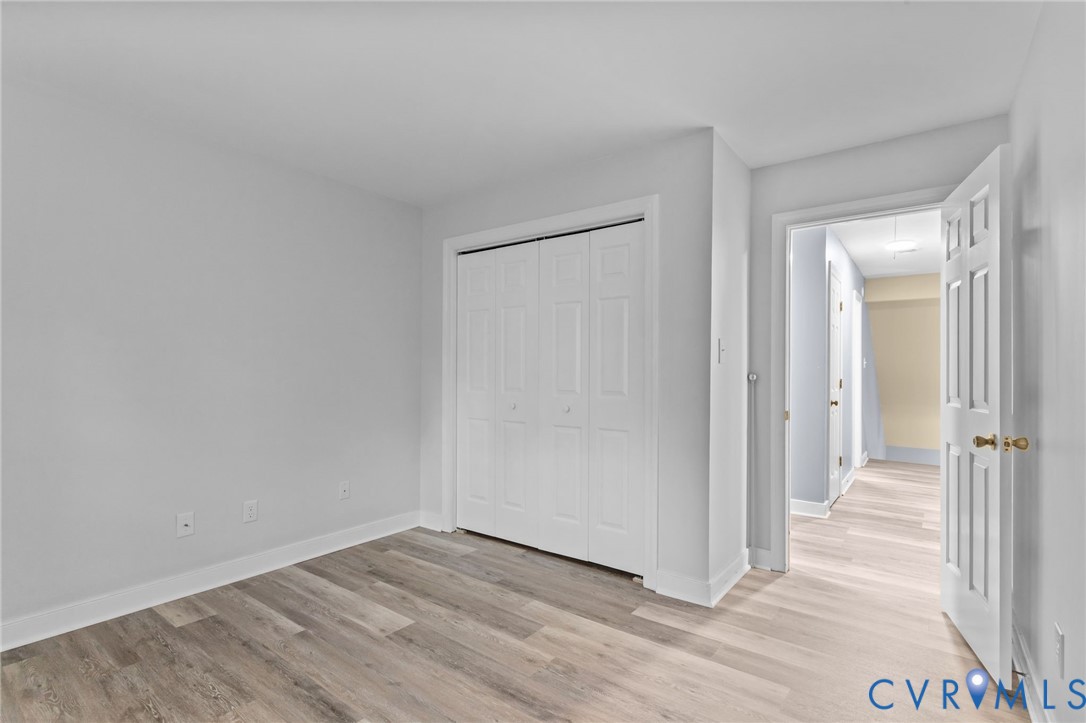 12601 Cottage Mill Road Midlothian, VA 23114 - Photo 28 of 50 a view of a hallway with wooden floor