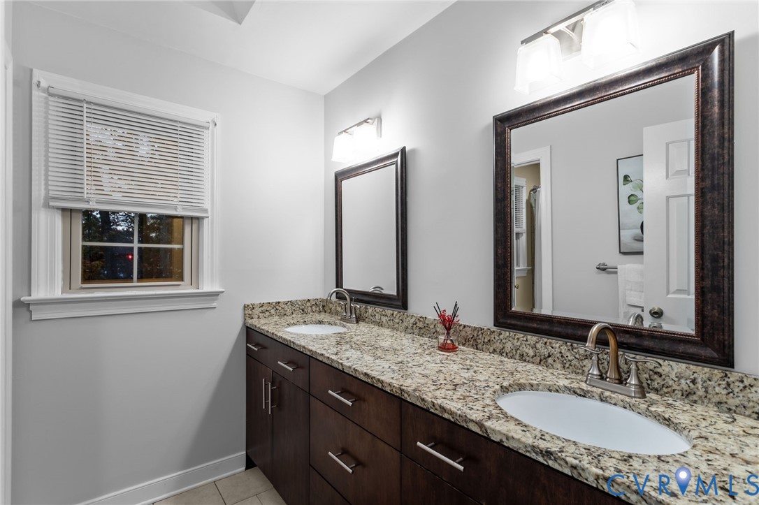 12601 Cottage Mill Road Midlothian, VA 23114 - Photo 33 of 50 a bathroom with a granite countertop sink and a mirror