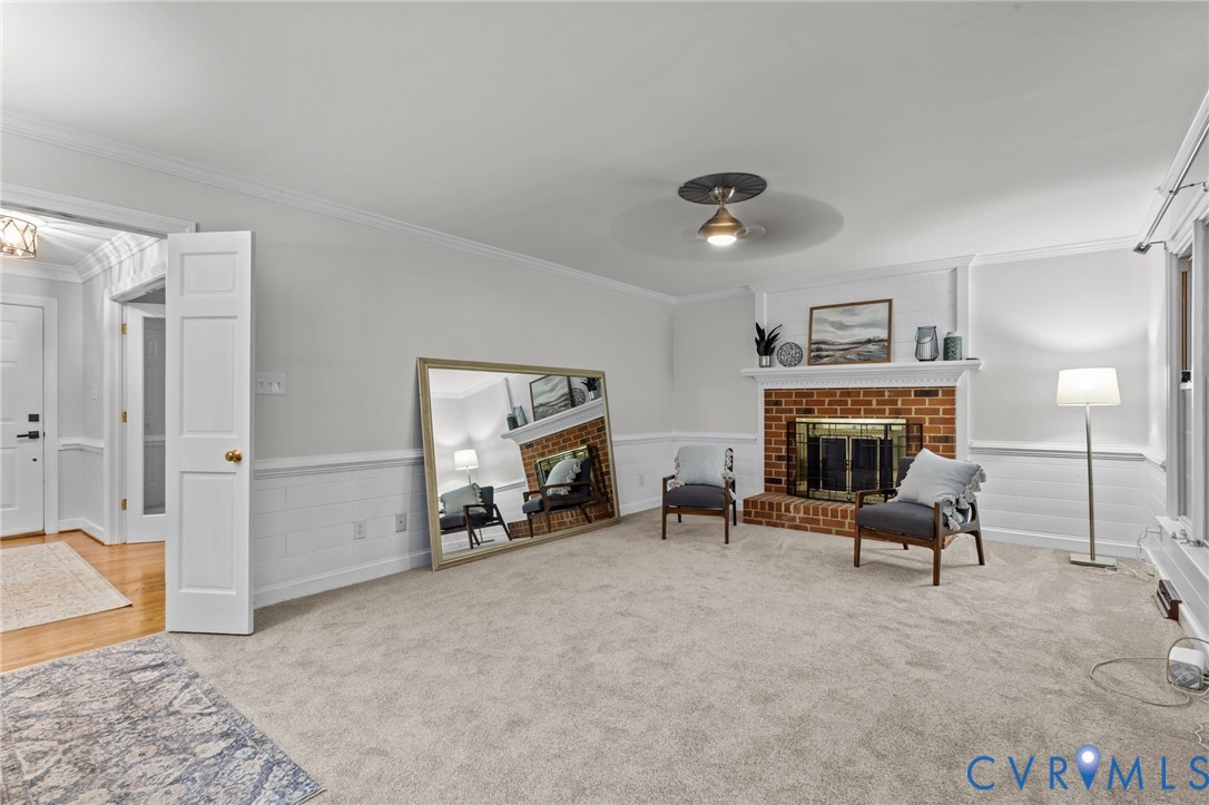 12601 Cottage Mill Road Midlothian, VA 23114 - Photo 37 of 50 a living room with furniture and a fireplace